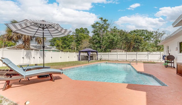 Chic beachside retreat 3-bedroom home with pool and WiFi in Titusville