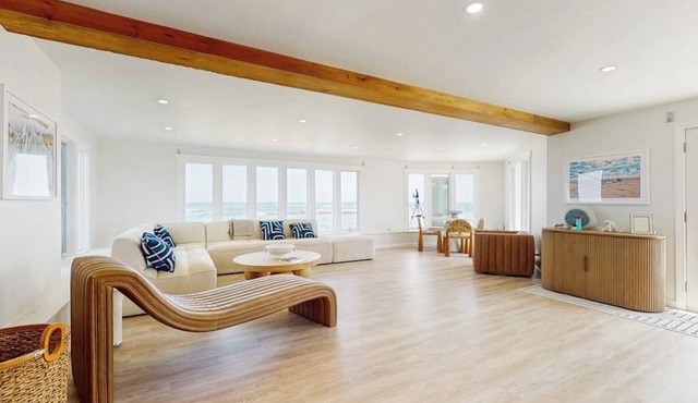 Coastal gem on the water with beach access, gorgeous views & spacious layout