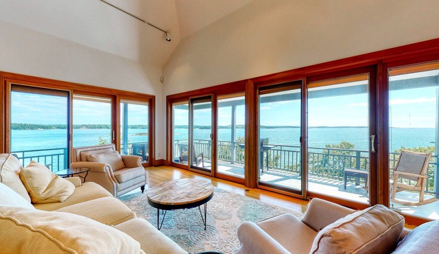 Delightful oceanfront home with amazing views, wrap-around deck & two fireplaces