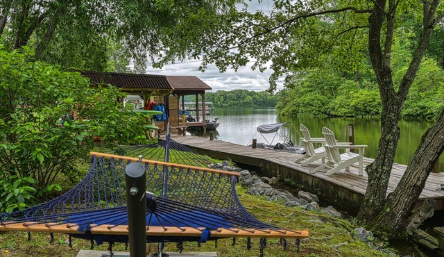 Dog-Friendly lakefront home with dock, game room, kayaks, hot tub, & firepit