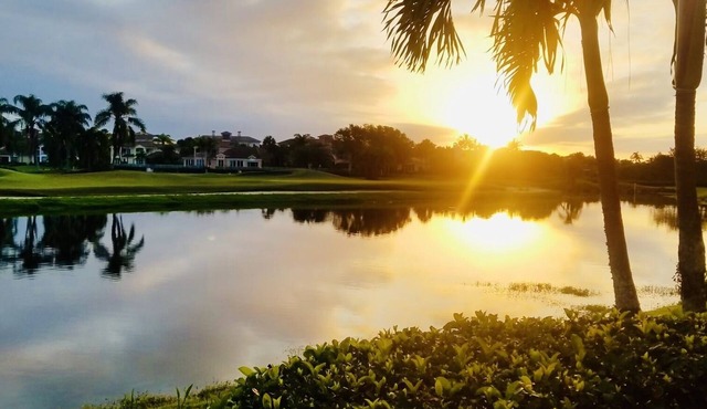 Gated Grand Harbor Townhome with beautiful views of the golf course and water