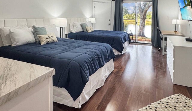 Ground Floor Waterfront Studio | 2 Queen Beds | Private Patio | Optional Saddlebrook Amenities