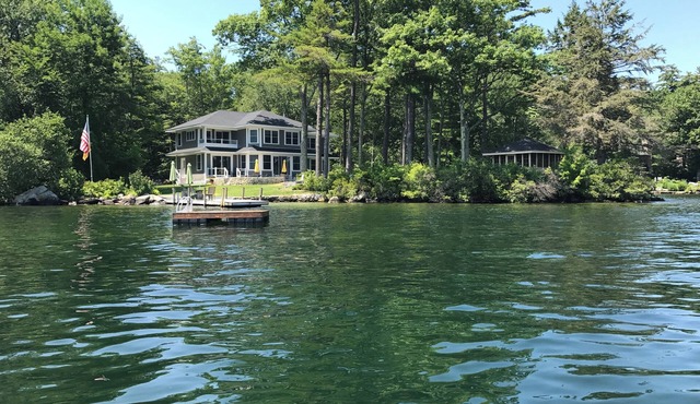 Lakefront 6-bedroom, 3.5 bath house with 2 docks & sandy swim area in Wolfeboro