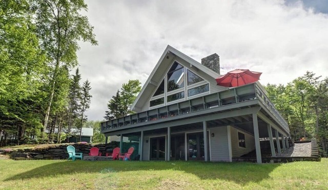 Lakefront Chalet-Style Home with Large Deck, a Dock & Beautiful Lake Views