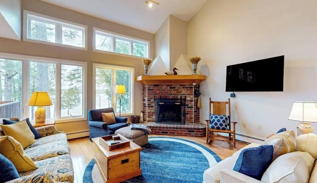 Lakefront condo with on-site pool, dock, swimming, firepit, & tennis
