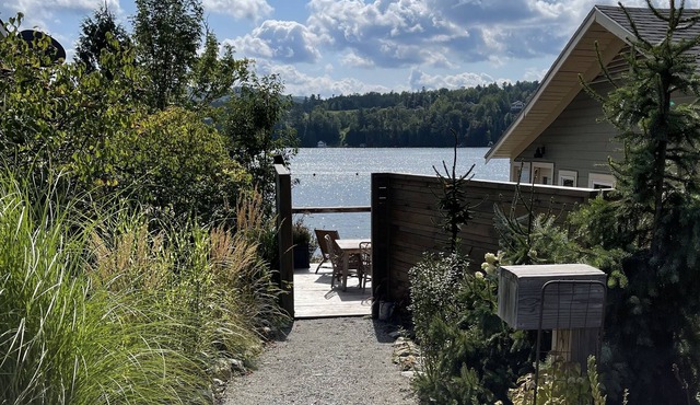 Pisgah Cottage perched on the waters edge of Lake Willoughby