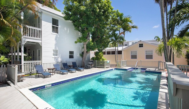 Shared Pool + Backyard Lounge | Charming Cottage | Steps to Waterfront Dining