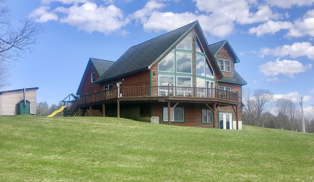 Spectacular Mountain Views from this Chalet Near Ski Resort and Lake