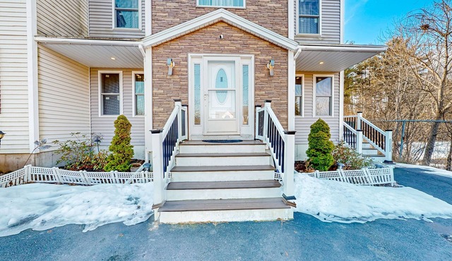 Stylish condo with a high-end kitchen, washer/dryer, & large yard