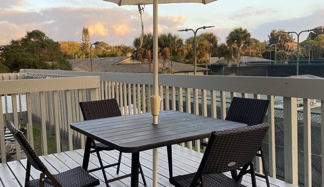Sunsets and Tennis Views! Totally remodeled condo with private deck