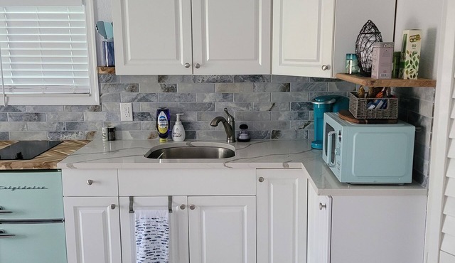 Take it easy at this cozy little getaway in a quiet residential neighborhood