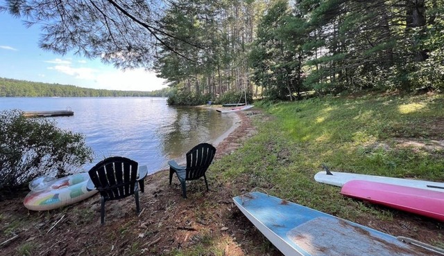 Tranquil Lakefront Retreat with Private Beach and Spacious Living
