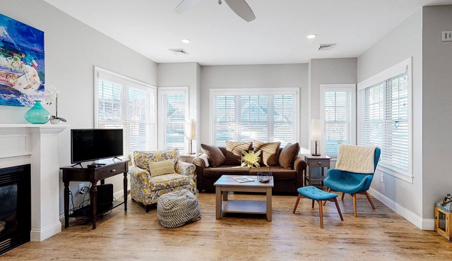 Two stroy condo with heated pool, gym, private patio, gas fireplace, W/D, AC