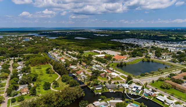 Waterfront Canal Retreat Pool, Dock, 10 Min to DTSP Sleeps 8