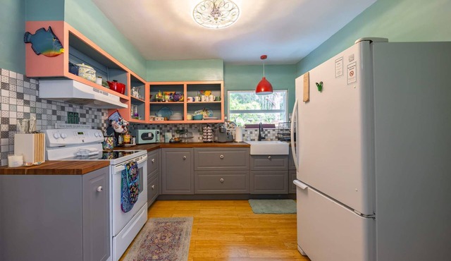 Whimsical Cocoa Escape: The Purple Picket Bungalow